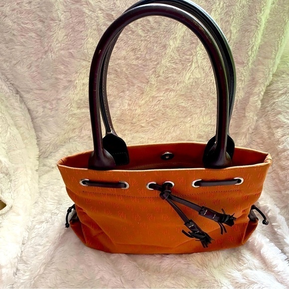 GENTLY used dooney bourke handbag orange. - Picture 1 of 7